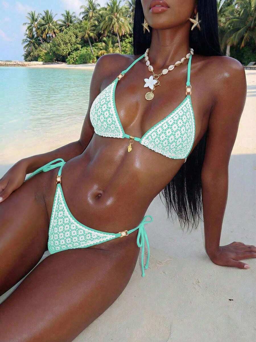 Women's triangle bikini set with contrast lace wireless bra top and ultra high waist tie side bottoms.