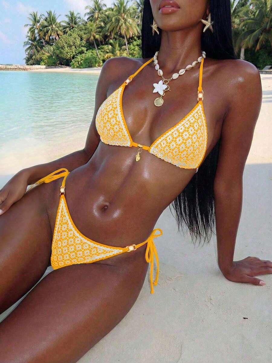 Women's triangle bikini set with contrast lace wireless bra top and ultra high waist tie side bottoms.
