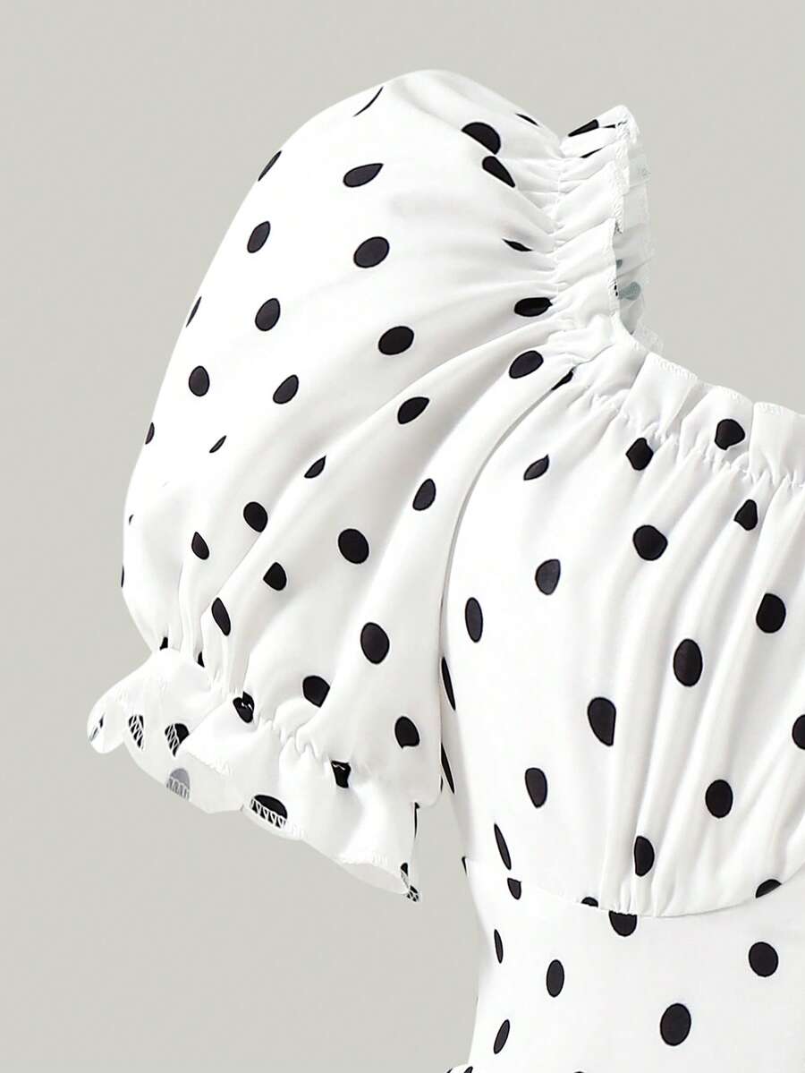 Apricot tween girls dress featuring square neckline, short puff sleeves, ruched bust, high waist, and flared A-line hem.