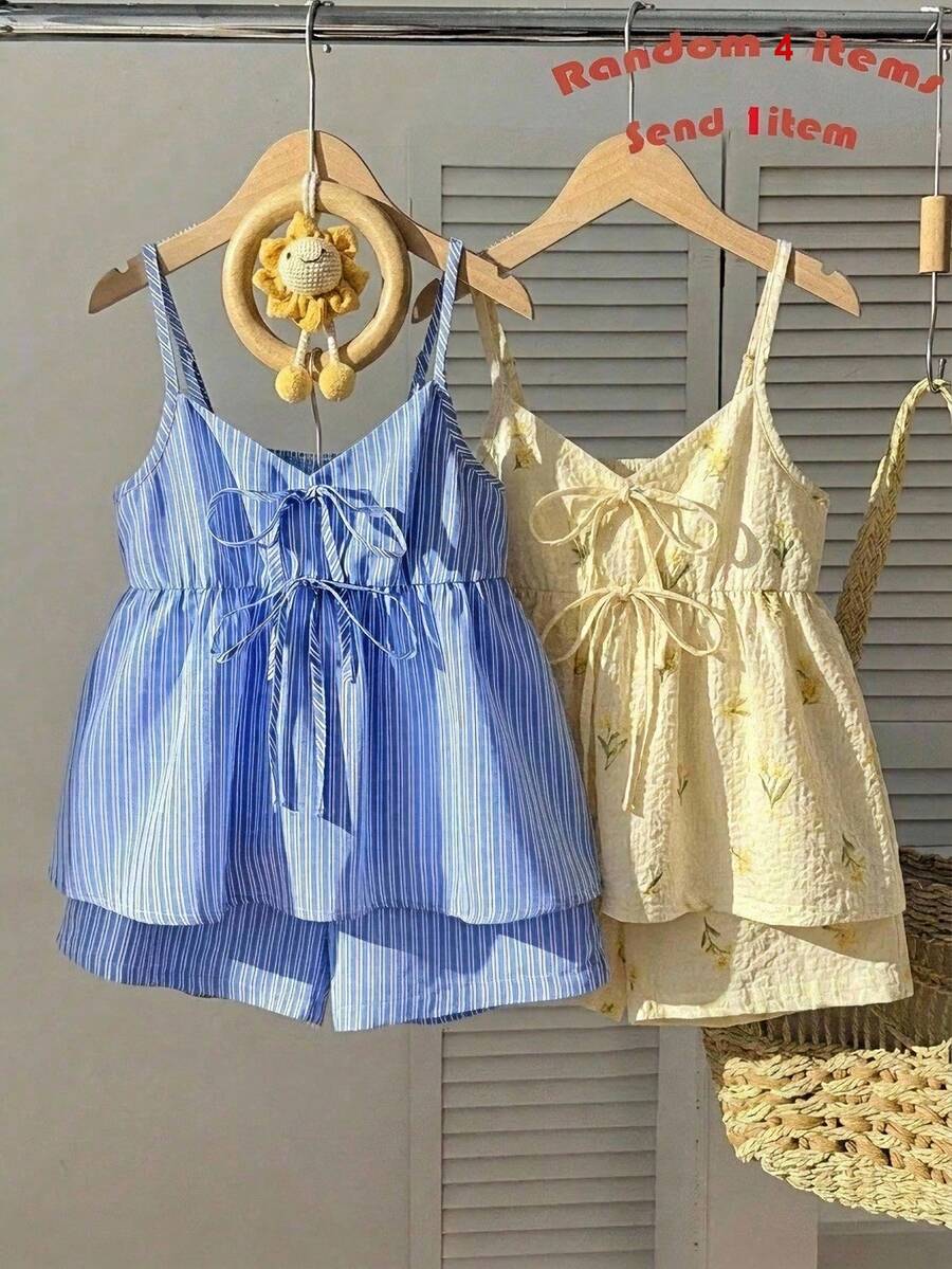Tween girls 2-piece summer vacation set featuring a multicolored geometric print sleeveless camisole top with bow knot detail and matching elastic waist shorts.