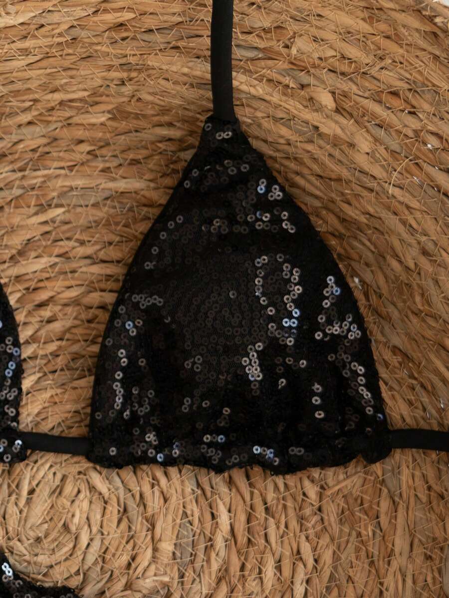 Women's apricot solid halter tie bikini top with triangle cups and matching tie-side swimsuit bottoms.