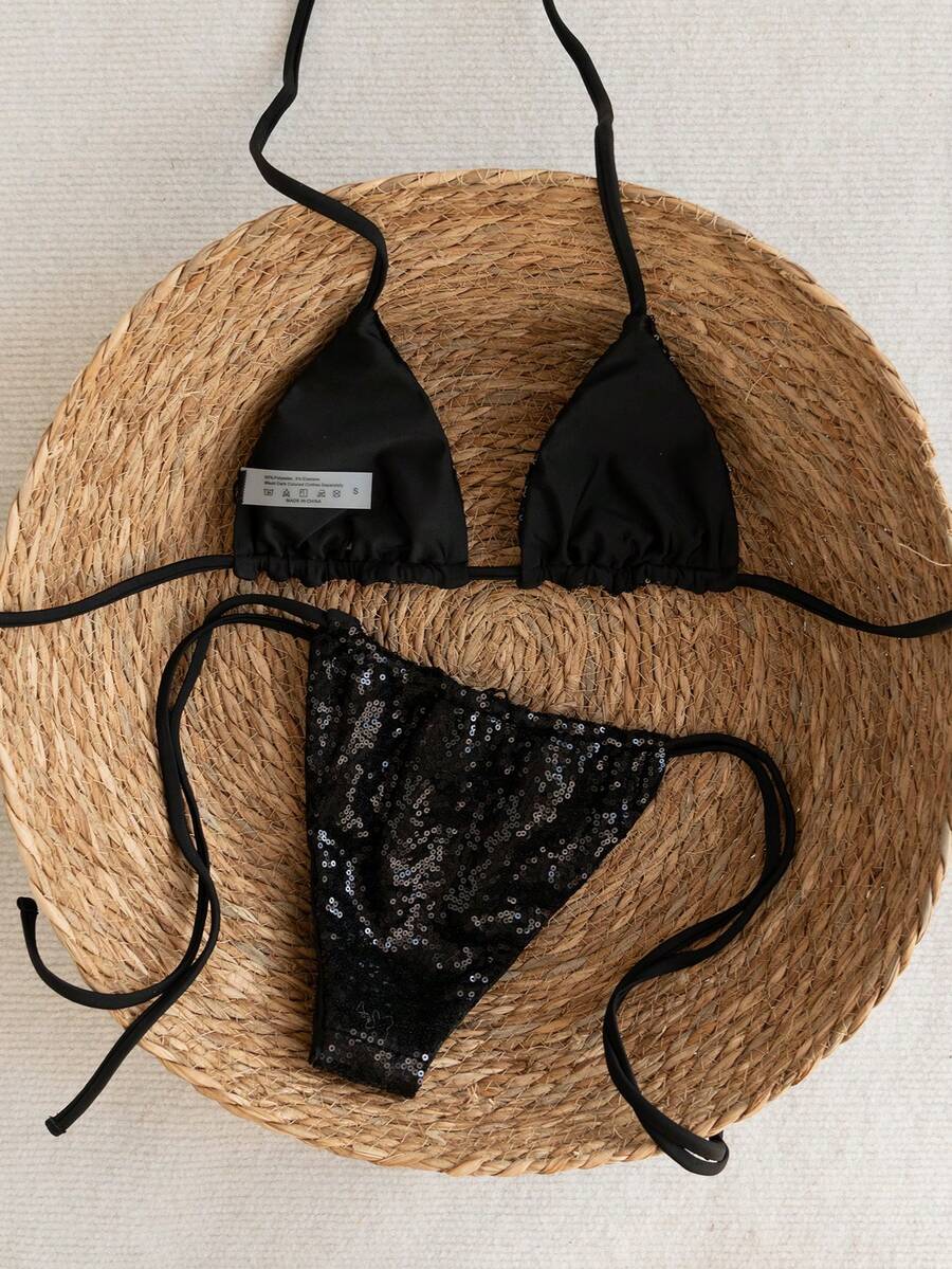 Women's apricot solid halter tie bikini top with triangle cups and matching tie-side swimsuit bottoms.