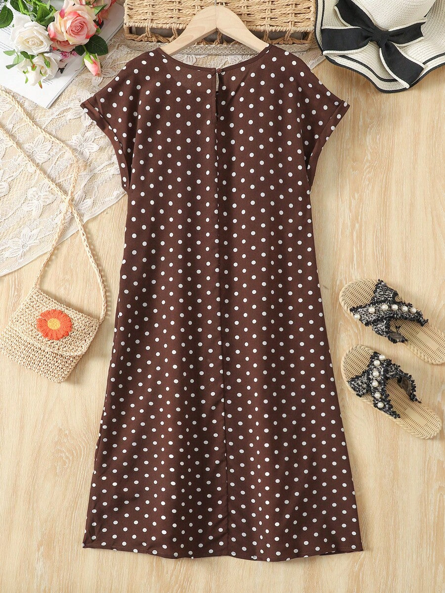 Tween girls casual black A-line long dress featuring short sleeves, a round neckline, and a decorative front bow with contrast lace trim.