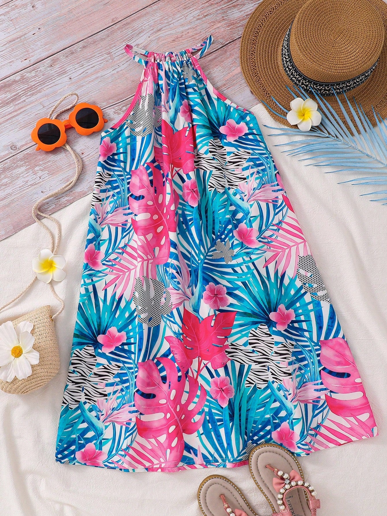 Tween girls floral halter neck sleeveless tunic dress with button detail, plant pattern, loose fit, short length, and vacation style for casual summer wear.