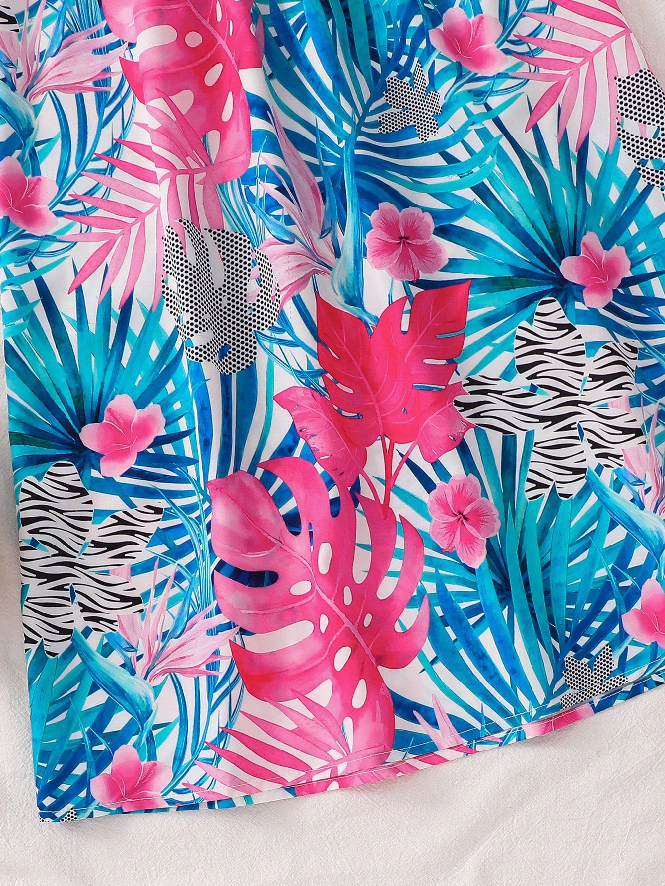 Tween girls floral halter neck sleeveless tunic dress with button detail, plant pattern, loose fit, short length, and vacation style for casual summer wear.