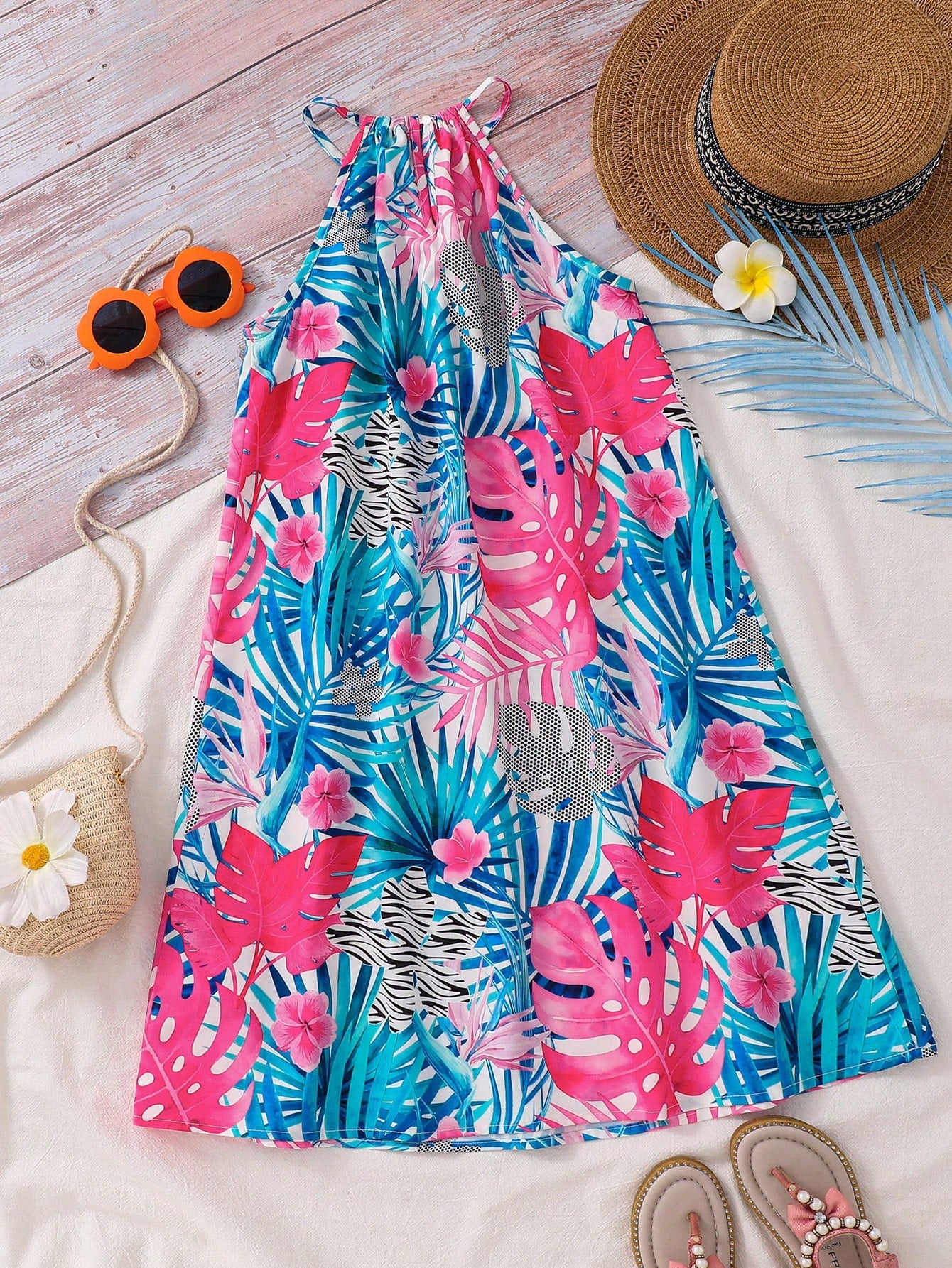Tween girls floral halter neck sleeveless tunic dress with button detail, plant pattern, loose fit, short length, and vacation style for casual summer wear.