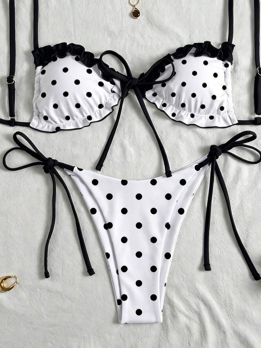 Women's beige two-piece bikini set featuring a wireless top with removable padding, spaghetti straps, tie back detail, and low waist hipster swimsuit bottoms.
