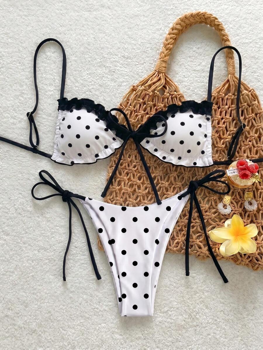 Women's beige two-piece bikini set featuring a wireless top with removable padding, spaghetti straps, tie back detail, and low waist hipster swimsuit bottoms.
