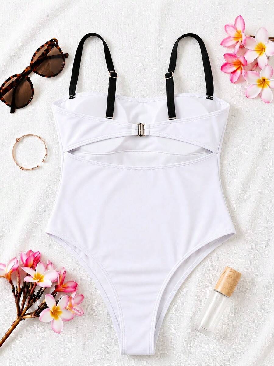 Black colorblock women's one-piece swimsuit with spaghetti straps and high stretch fabric.
