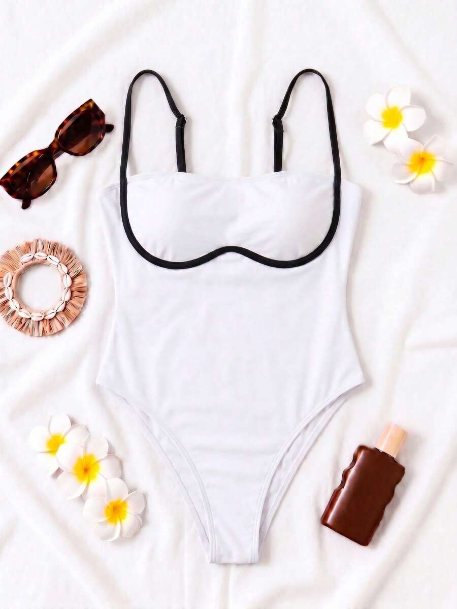 Black colorblock women's one-piece swimsuit with spaghetti straps and high stretch fabric.