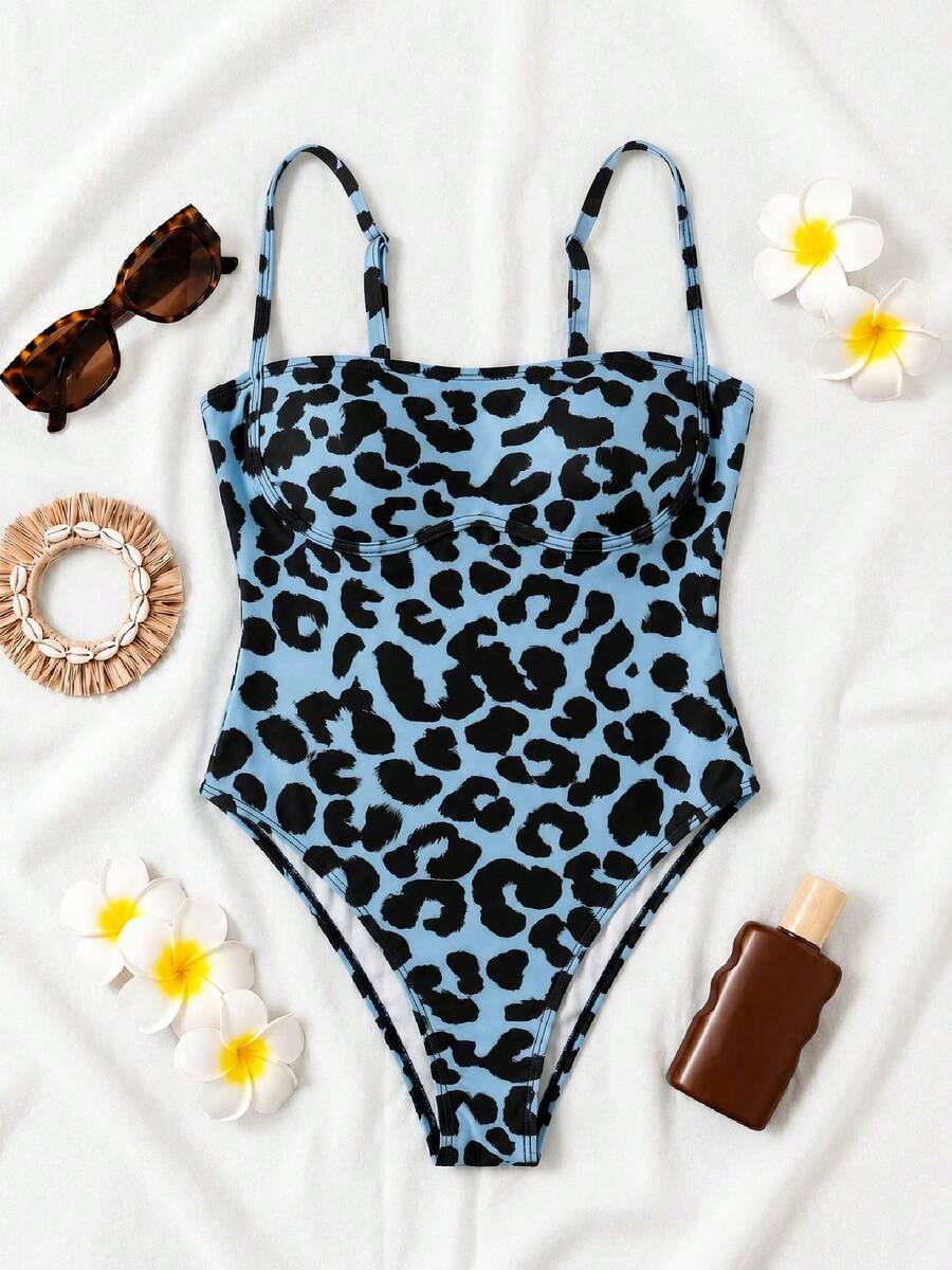 Black colorblock women's one-piece swimsuit with spaghetti straps and high stretch fabric.