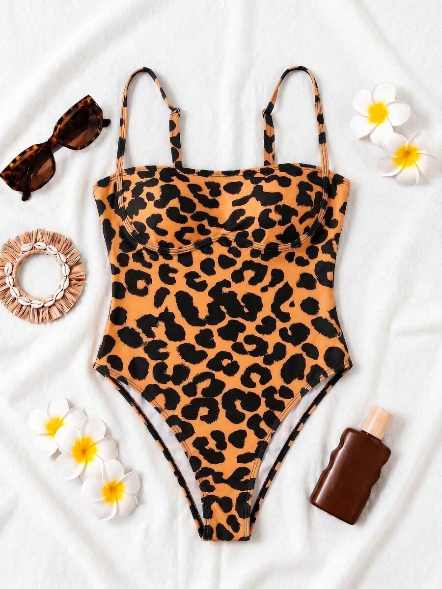 Black colorblock women's one-piece swimsuit with spaghetti straps and high stretch fabric.