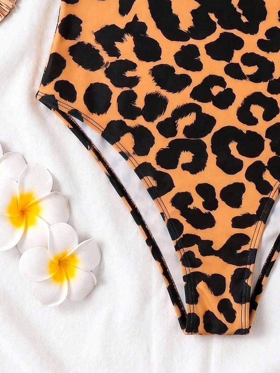 Black colorblock women's one-piece swimsuit with spaghetti straps and high stretch fabric.