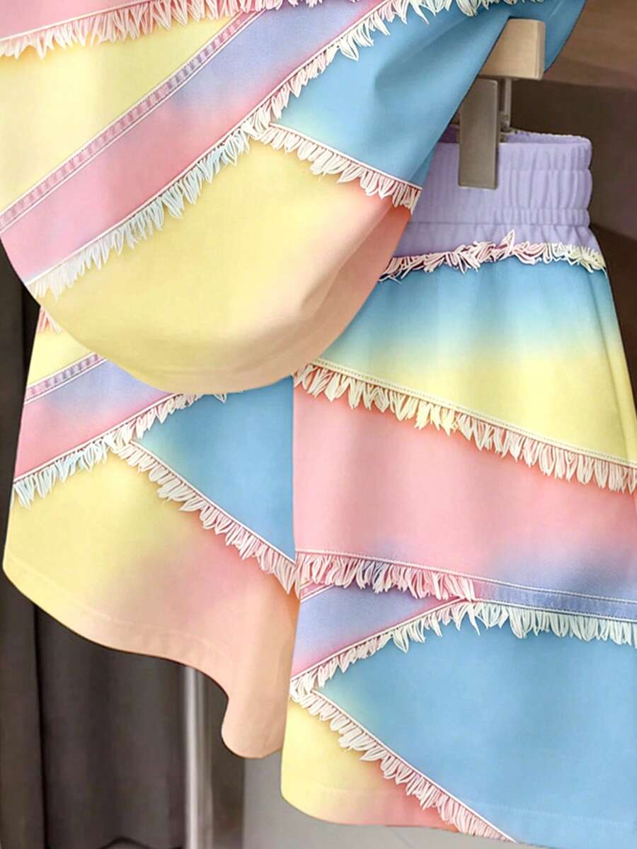 Girls' multicolor short sleeve T-shirt and shorts set featuring a cute cherry and bow print with round neck top and matching shorts.
