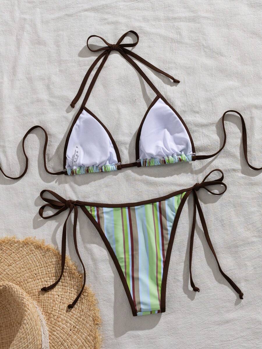 Women's two-piece halter triangle bikini set featuring a backless tie-back top with removable padding and matching tie-side mid-waist bottoms.
