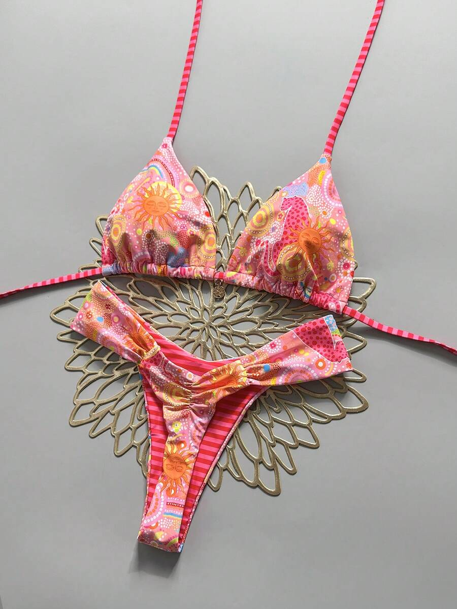 Women's 2-piece triangle cup bikini set in solid color featuring woven pearl shell decoration, halter neckline, and high-waist side-tie ruched bottoms.