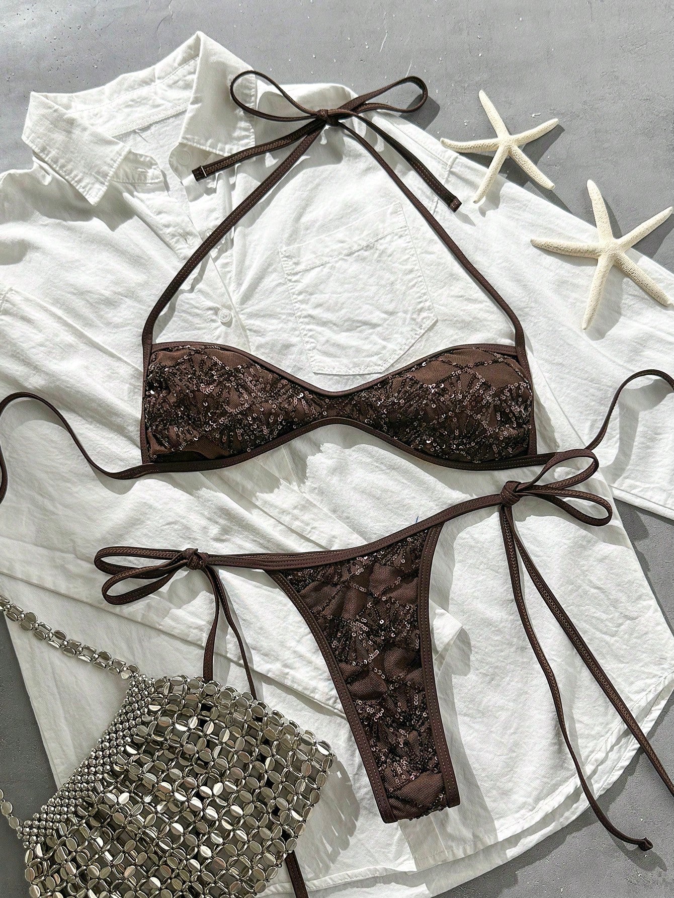 Apricot 2-piece sequin textured halter bikini set featuring a wireless top with lace-up backless ties and matching low-waist side-tie thong bottoms.