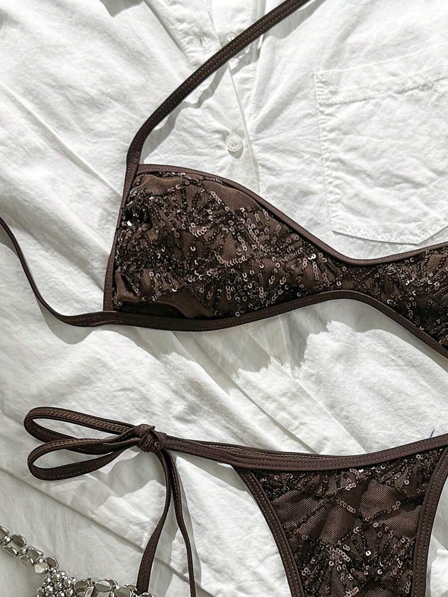 Apricot 2-piece sequin textured halter bikini set featuring a wireless top with lace-up backless ties and matching low-waist side-tie thong bottoms.