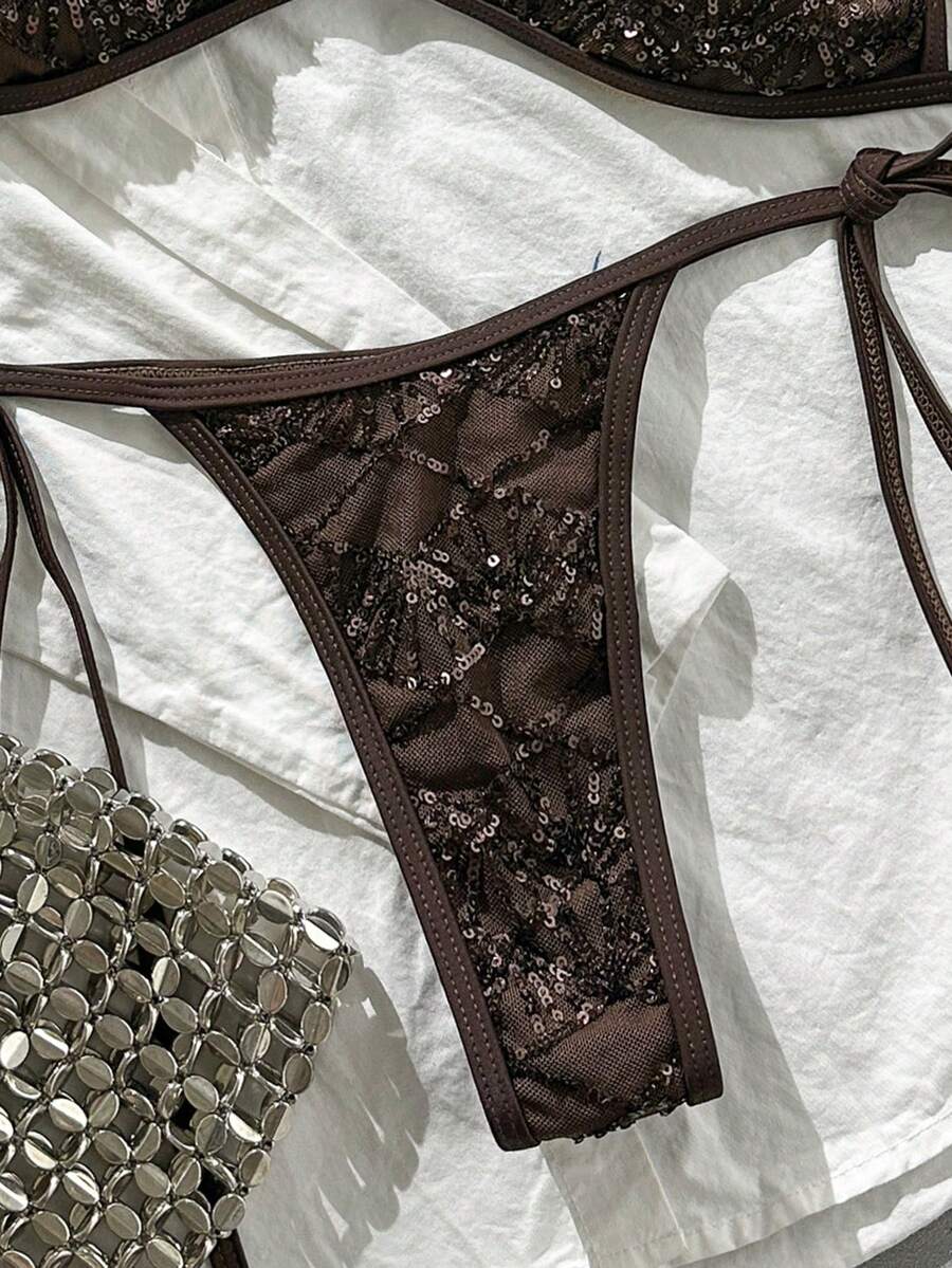 Apricot 2-piece sequin textured halter bikini set featuring a wireless top with lace-up backless ties and matching low-waist side-tie thong bottoms.
