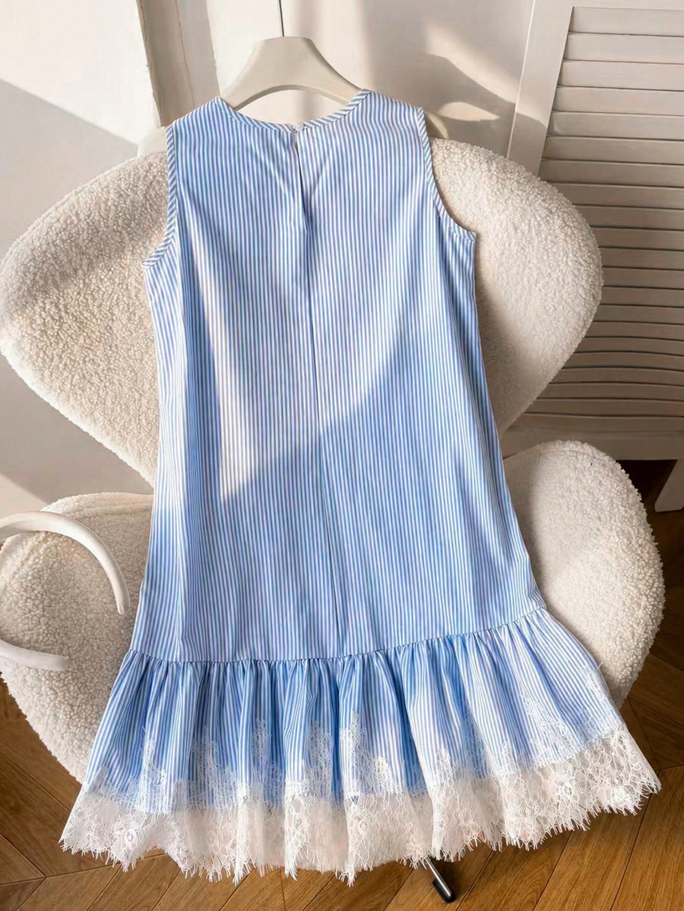 Tween girls sleeveless halter tunic dress with colorful rainbow striped colorblock pattern, button detail, short length, and regular fit for summer vacation or beach wear.