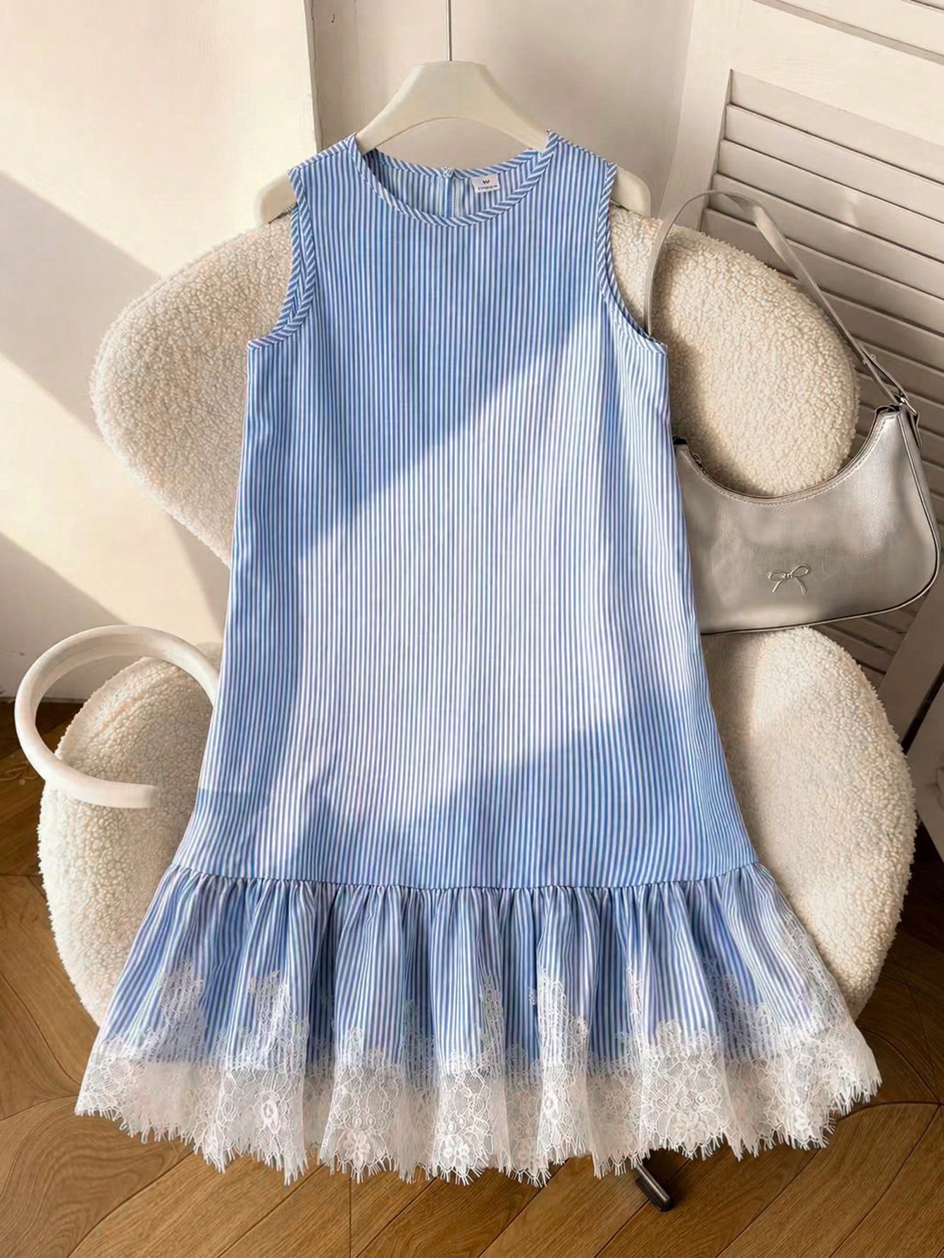 Tween girls sleeveless halter tunic dress with colorful rainbow striped colorblock pattern, button detail, short length, and regular fit for summer vacation or beach wear.