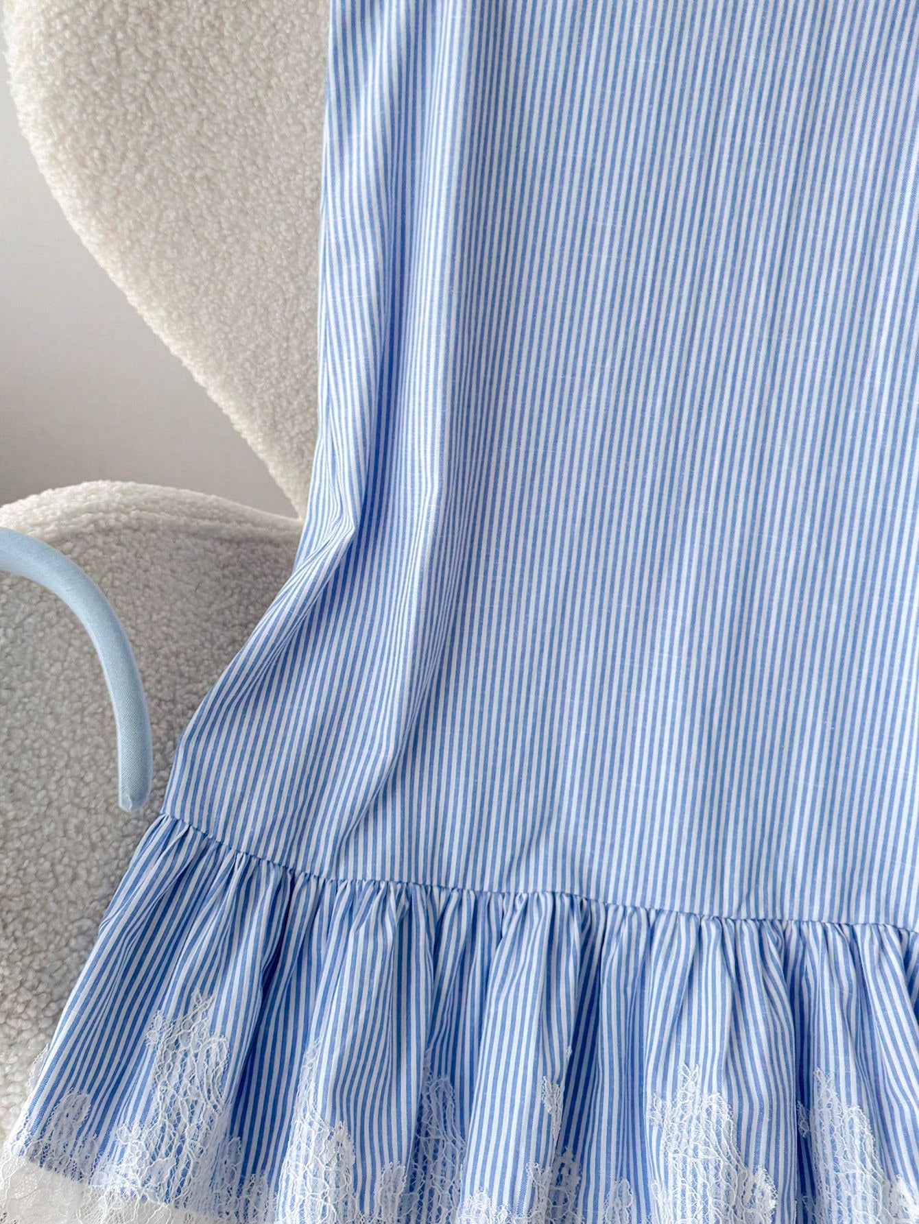 Tween girls sleeveless halter tunic dress with colorful rainbow striped colorblock pattern, button detail, short length, and regular fit for summer vacation or beach wear.