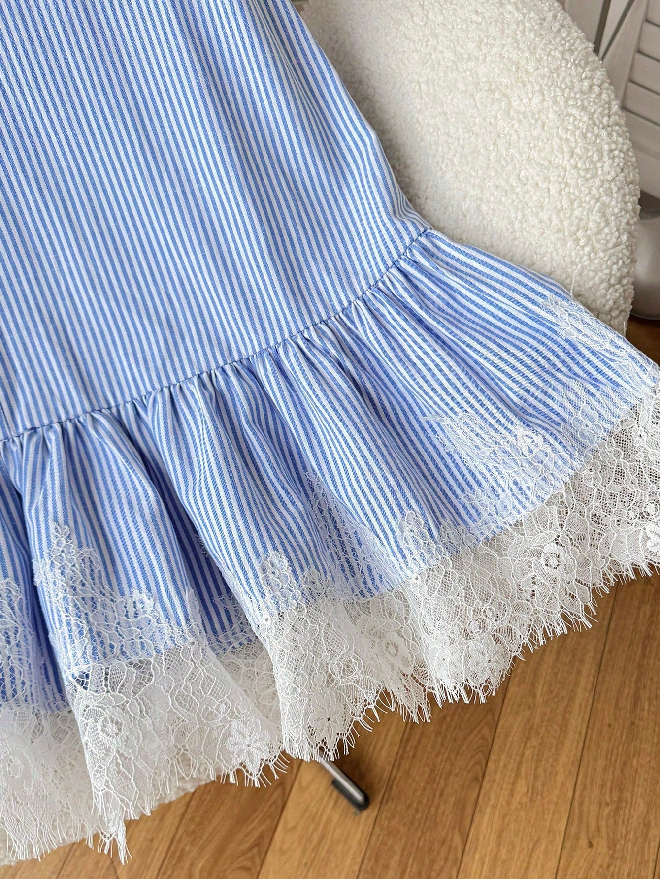 Tween girls sleeveless halter tunic dress with colorful rainbow striped colorblock pattern, button detail, short length, and regular fit for summer vacation or beach wear.