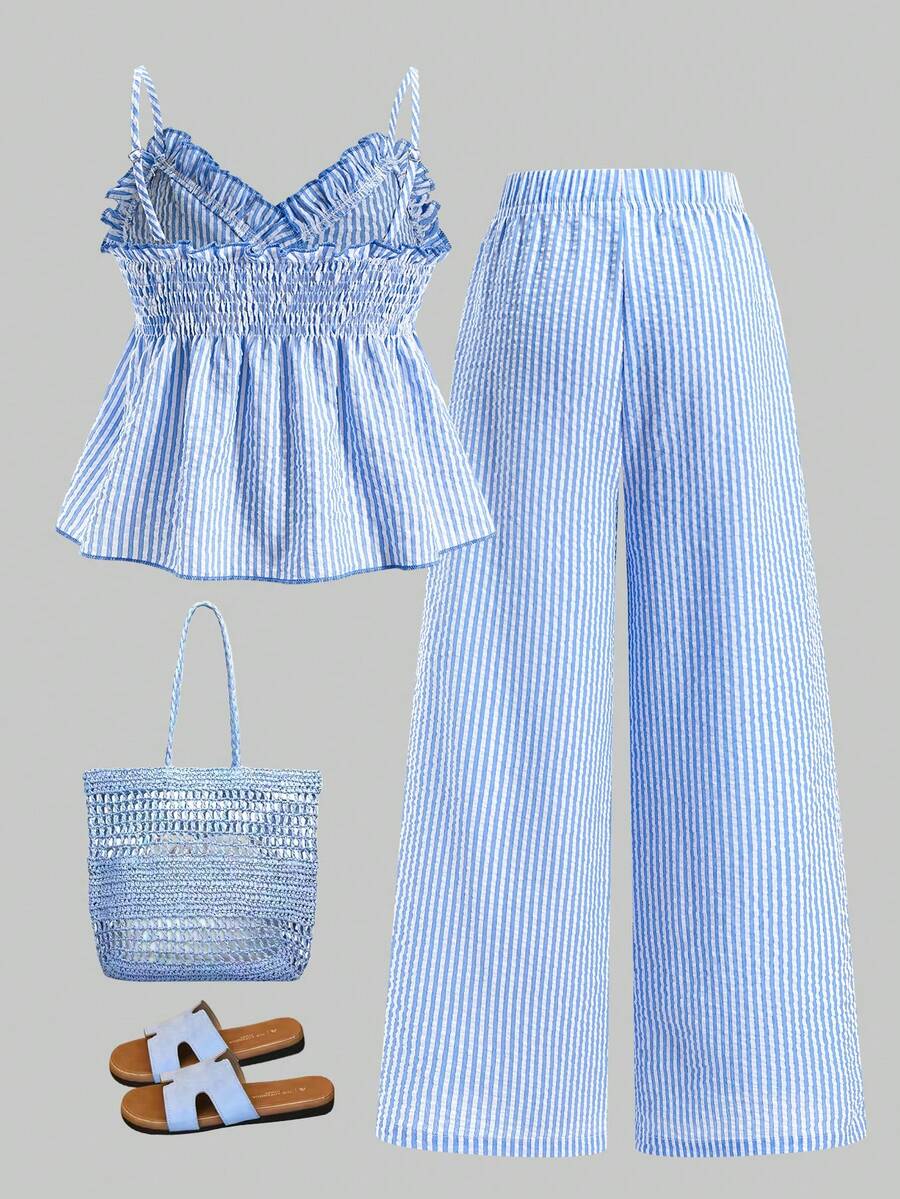 Tween girls 2-piece set featuring a short V-neck ruffle camisole top and matching long pants made of bubble crinkle fabric.