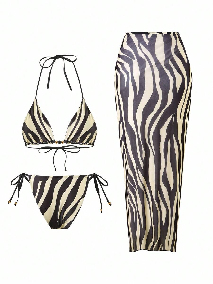 Women's 3-piece zebra print swimwear set featuring a wireless halter top, tie-side bottoms, and a long sheer mesh skirt cover-up.