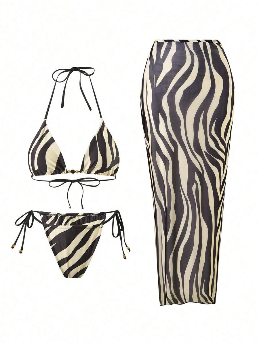 Women's 3-piece zebra print swimwear set featuring a wireless halter top, tie-side bottoms, and a long sheer mesh skirt cover-up.