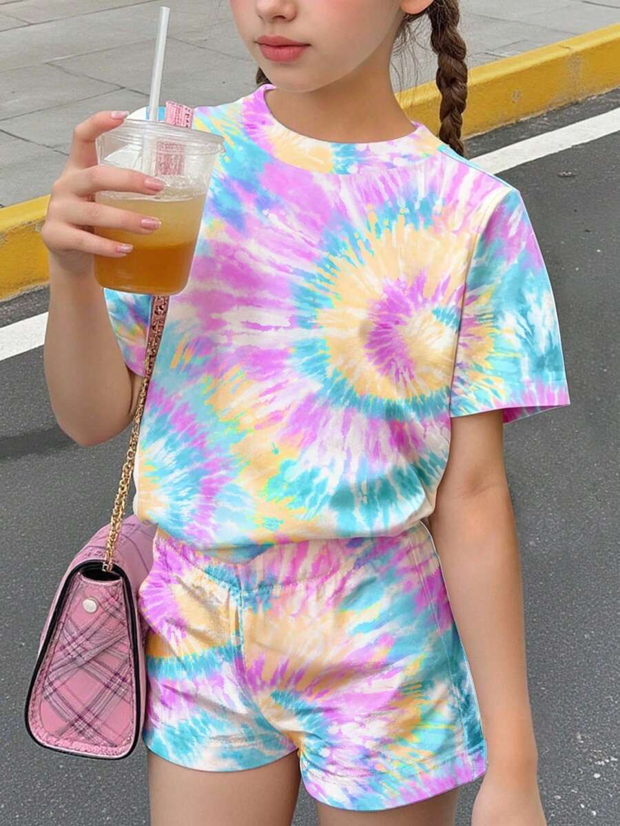 Tween girls multicolor tie-dye 2-piece outfit set featuring a drop-shoulder short-sleeve t-shirt and matching loose track shorts with side pockets.