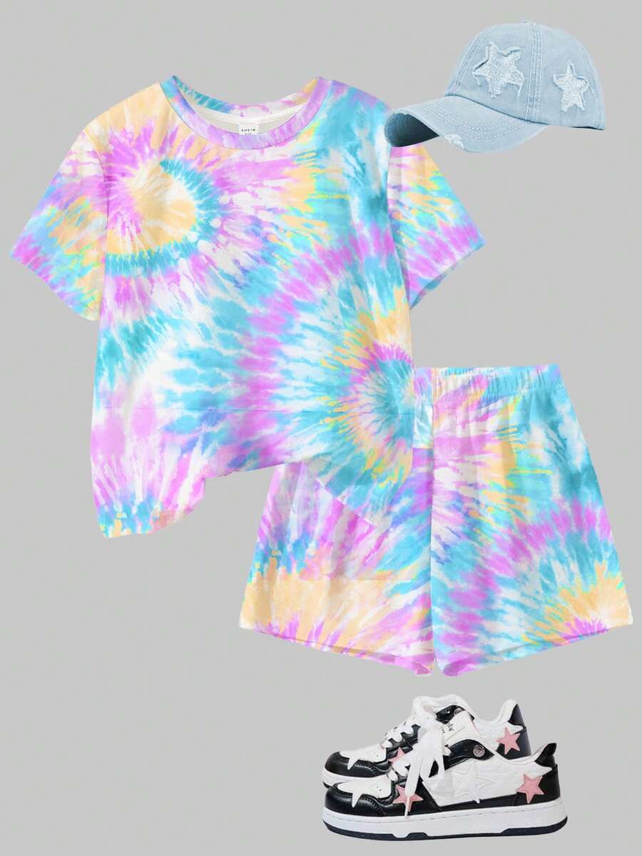 Tween girls multicolor tie-dye 2-piece outfit set featuring a drop-shoulder short-sleeve t-shirt and matching loose track shorts with side pockets.
