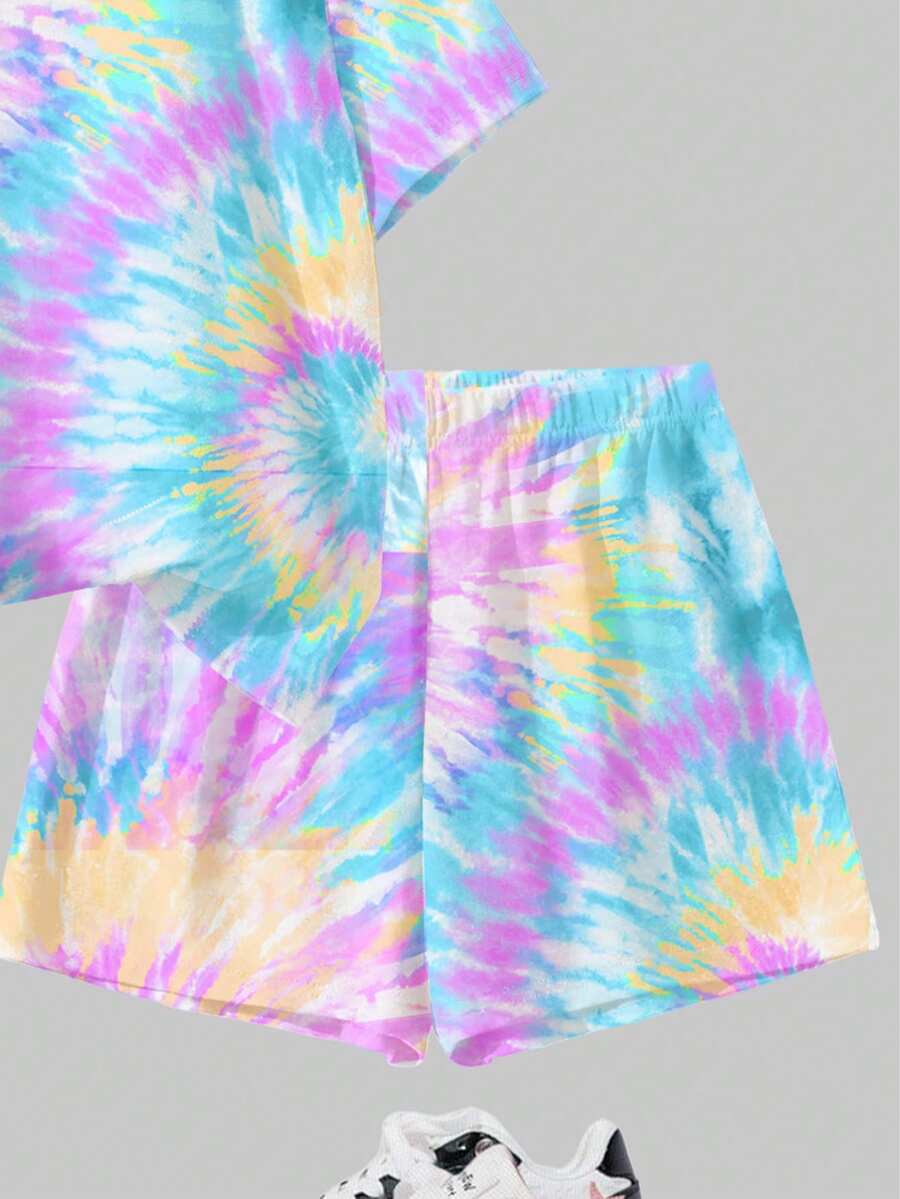 Tween girls multicolor tie-dye 2-piece outfit set featuring a drop-shoulder short-sleeve t-shirt and matching loose track shorts with side pockets.