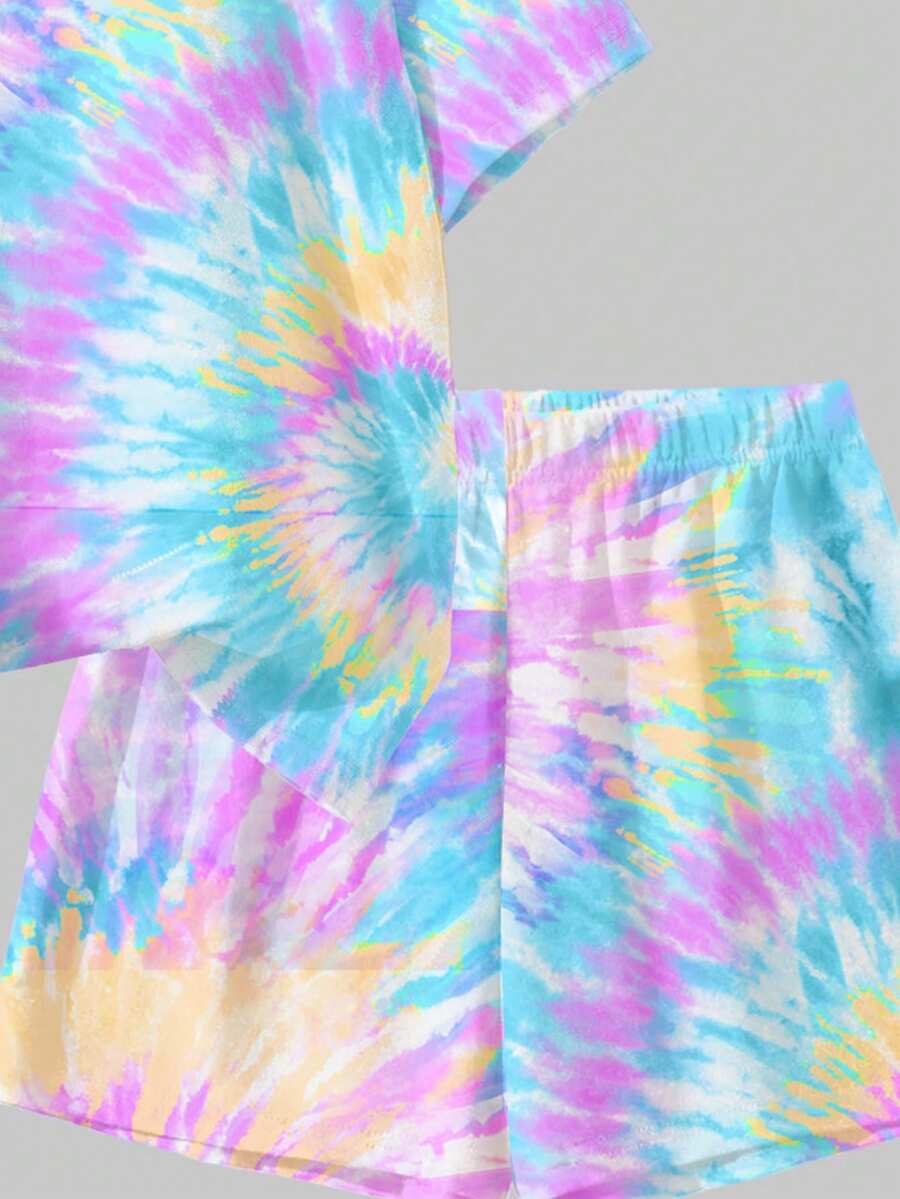 Tween girls multicolor tie-dye 2-piece outfit set featuring a drop-shoulder short-sleeve t-shirt and matching loose track shorts with side pockets.