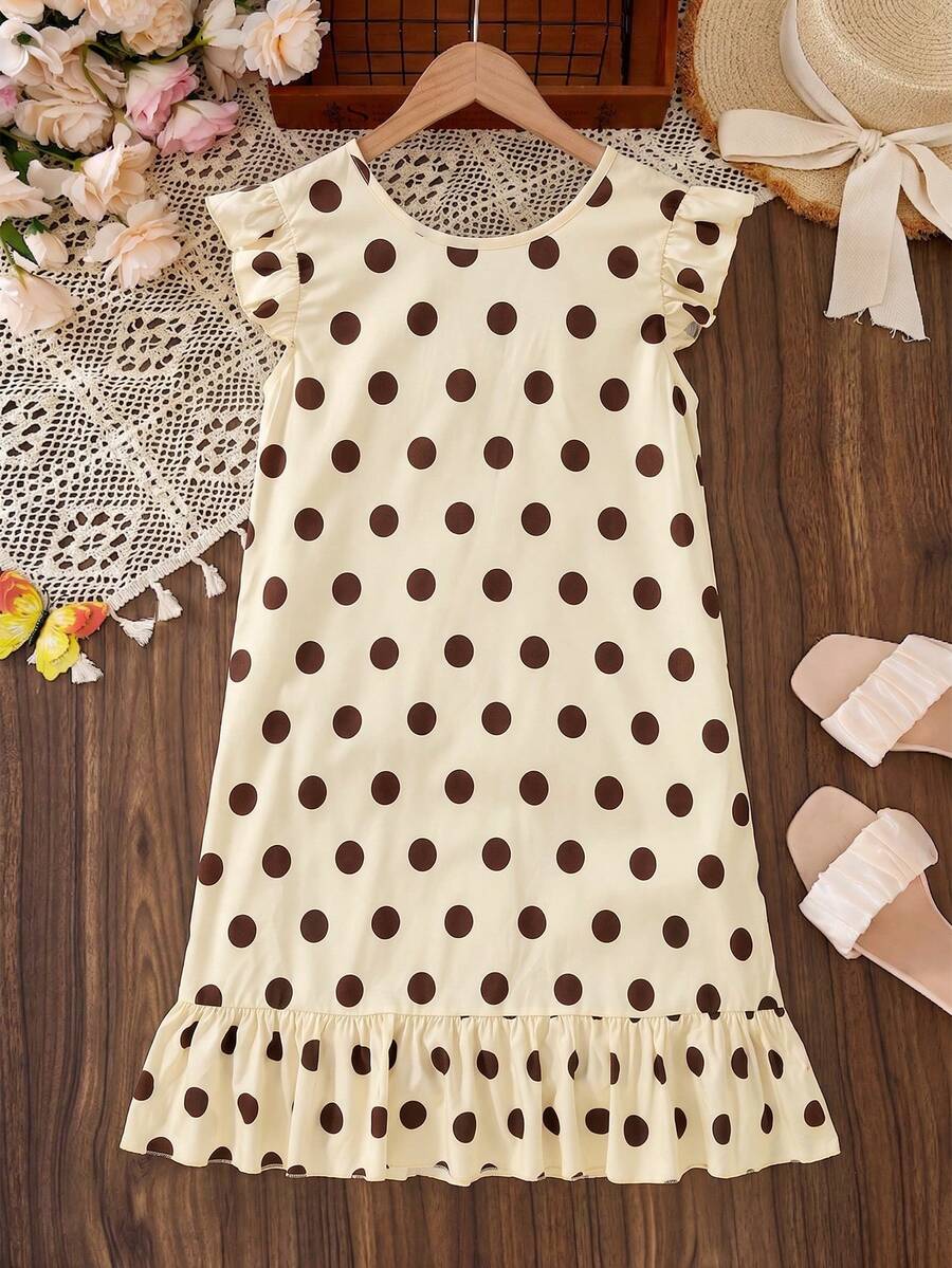 Tween girls apricot vacation midi dress featuring a round neck, cut out details, ruffle flounce accents, and geometric pattern.