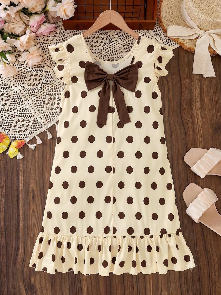 Tween girls apricot vacation midi dress featuring a round neck, cut out details, ruffle flounce accents, and geometric pattern.