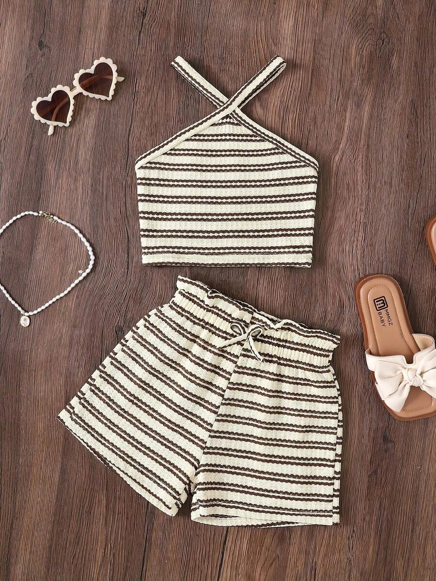 Black and white striped 2-piece set for tween girls featuring a halter sleeveless pullover top with criss-cross knot detail and matching paperbag waist shorts.