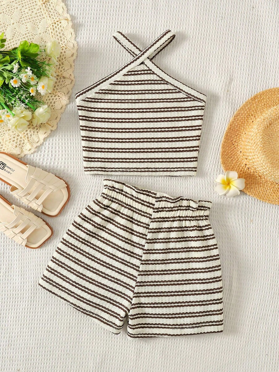 Black and white striped 2-piece set for tween girls featuring a halter sleeveless pullover top with criss-cross knot detail and matching paperbag waist shorts.