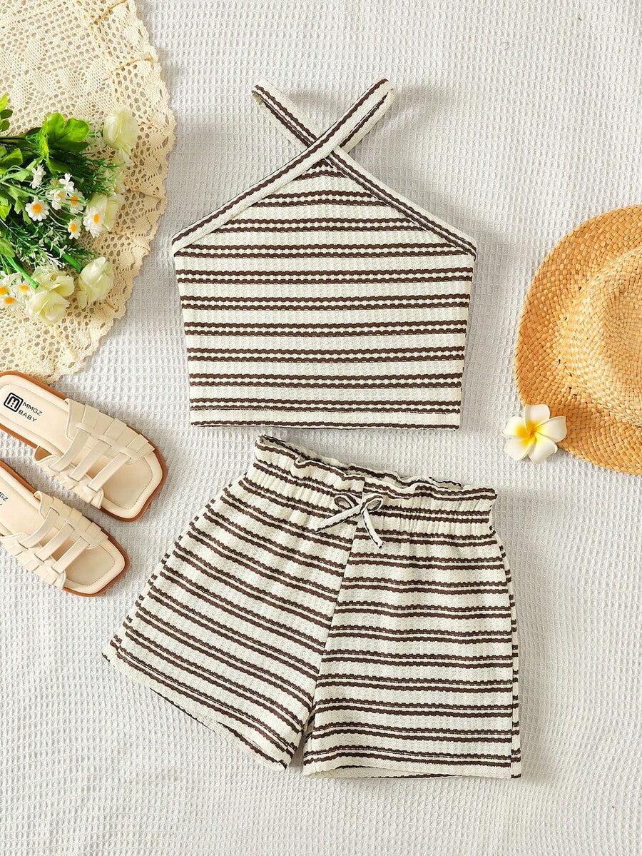 Black and white striped 2-piece set for tween girls featuring a halter sleeveless pullover top with criss-cross knot detail and matching paperbag waist shorts.