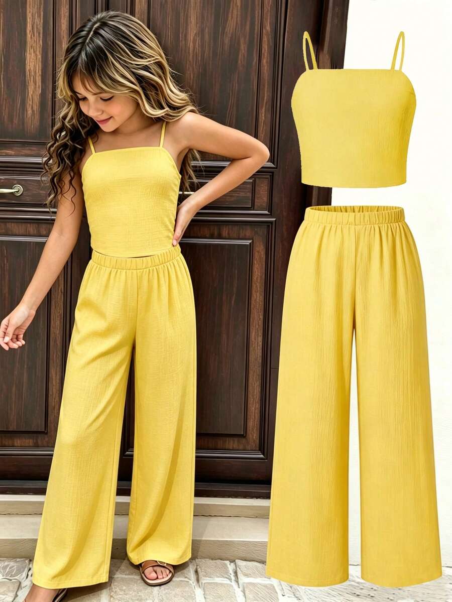 Tween girls casual 2-piece set featuring an apricot woven camisole crop top with back shirring and matching high-waisted loose long pants.