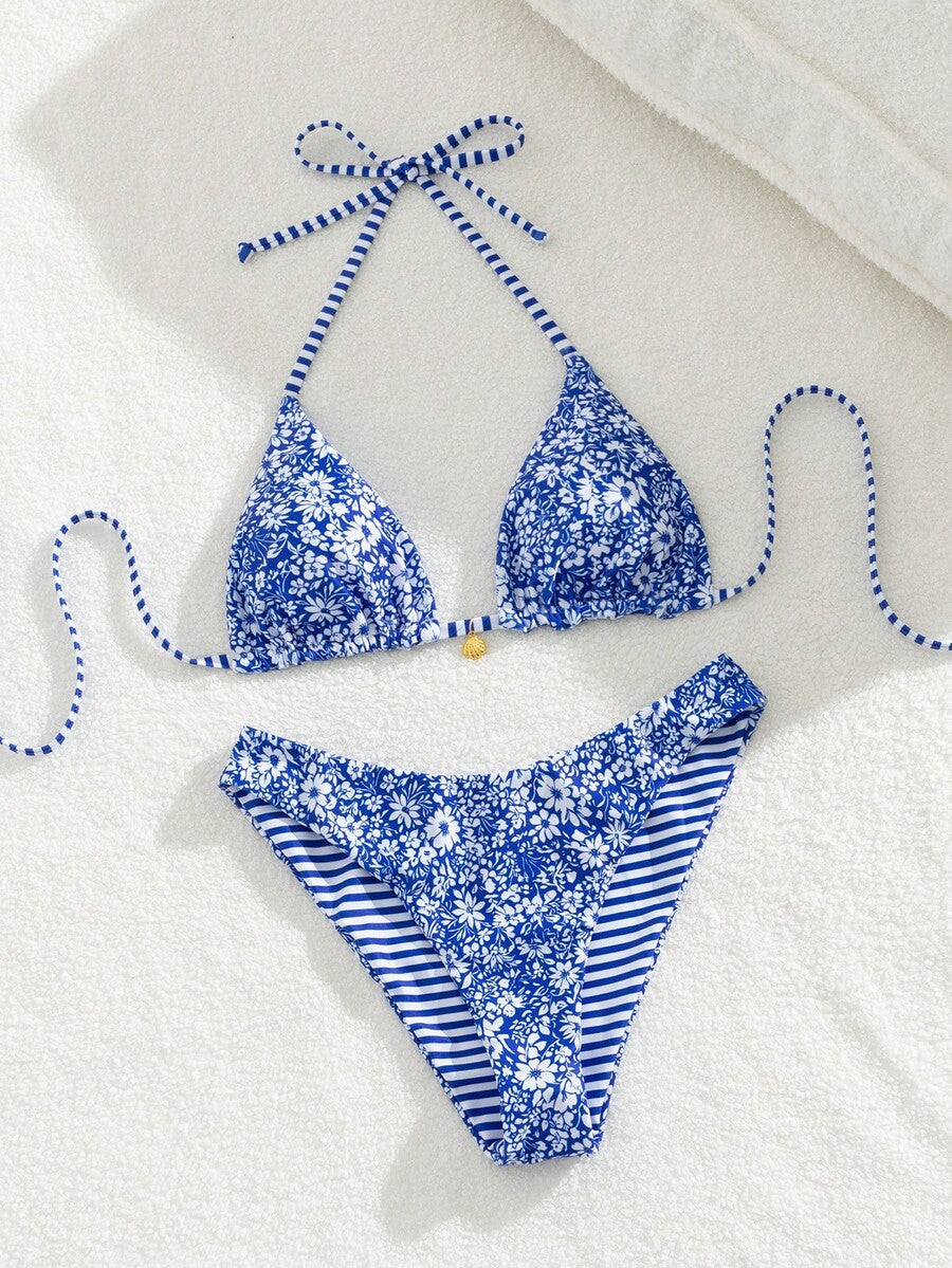 Women's black textured plaid 2-piece bikini set featuring a halter neckline, wireless triangle cups with removable padding, and mid-waist bottoms.