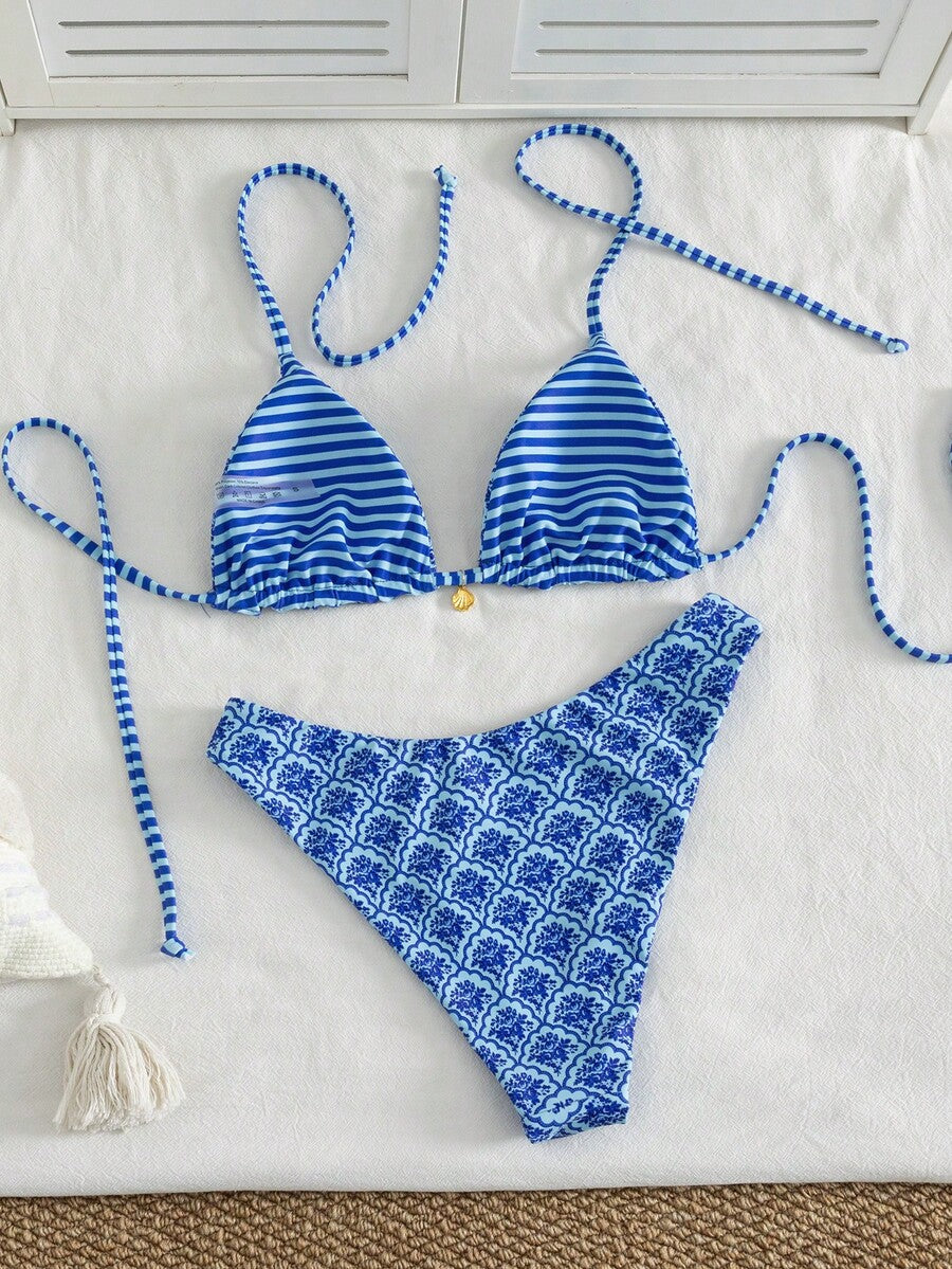 Women's black textured plaid 2-piece bikini set featuring a halter neckline, wireless triangle cups with removable padding, and mid-waist bottoms.