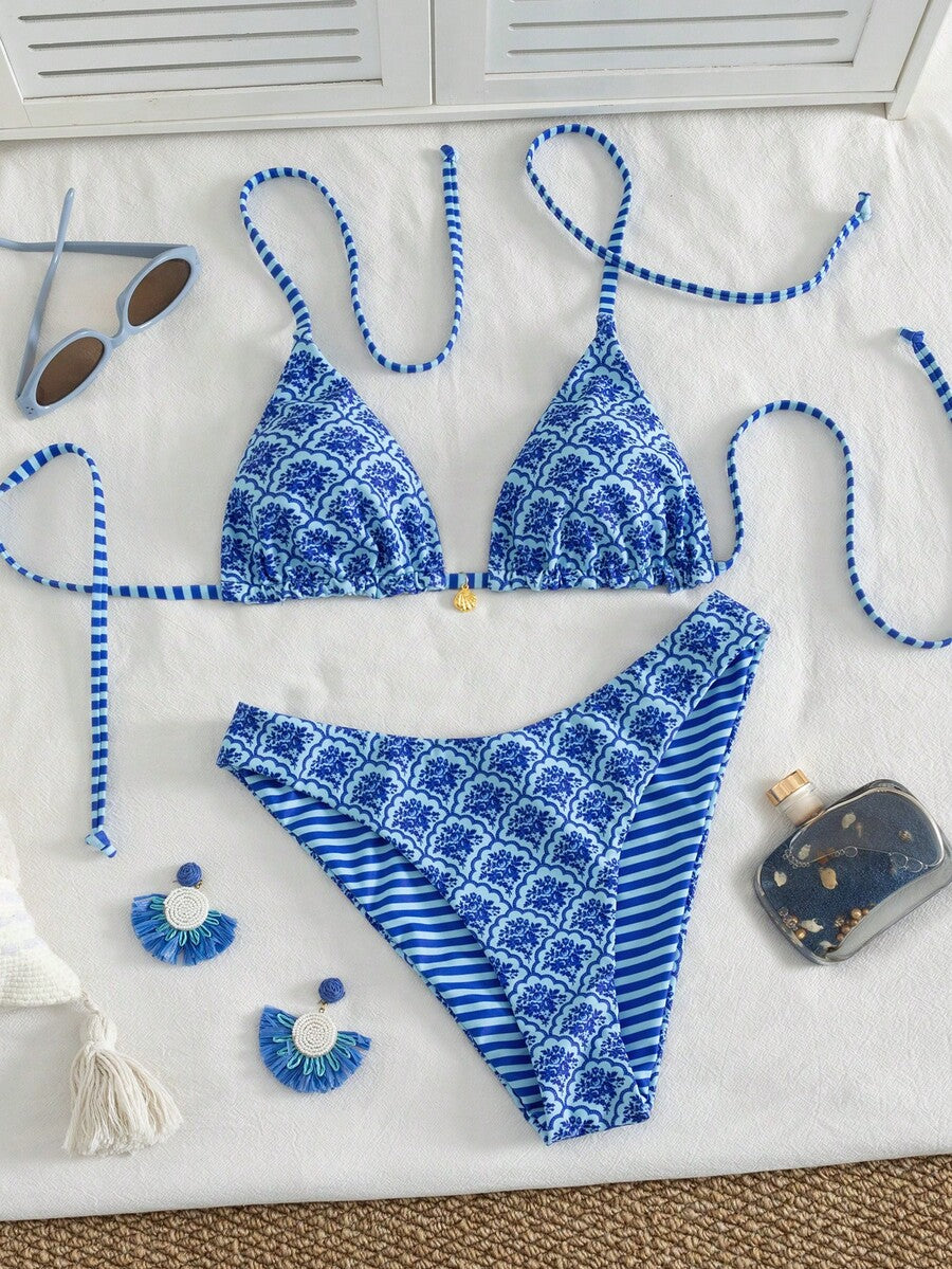 Women's black textured plaid 2-piece bikini set featuring a halter neckline, wireless triangle cups with removable padding, and mid-waist bottoms.