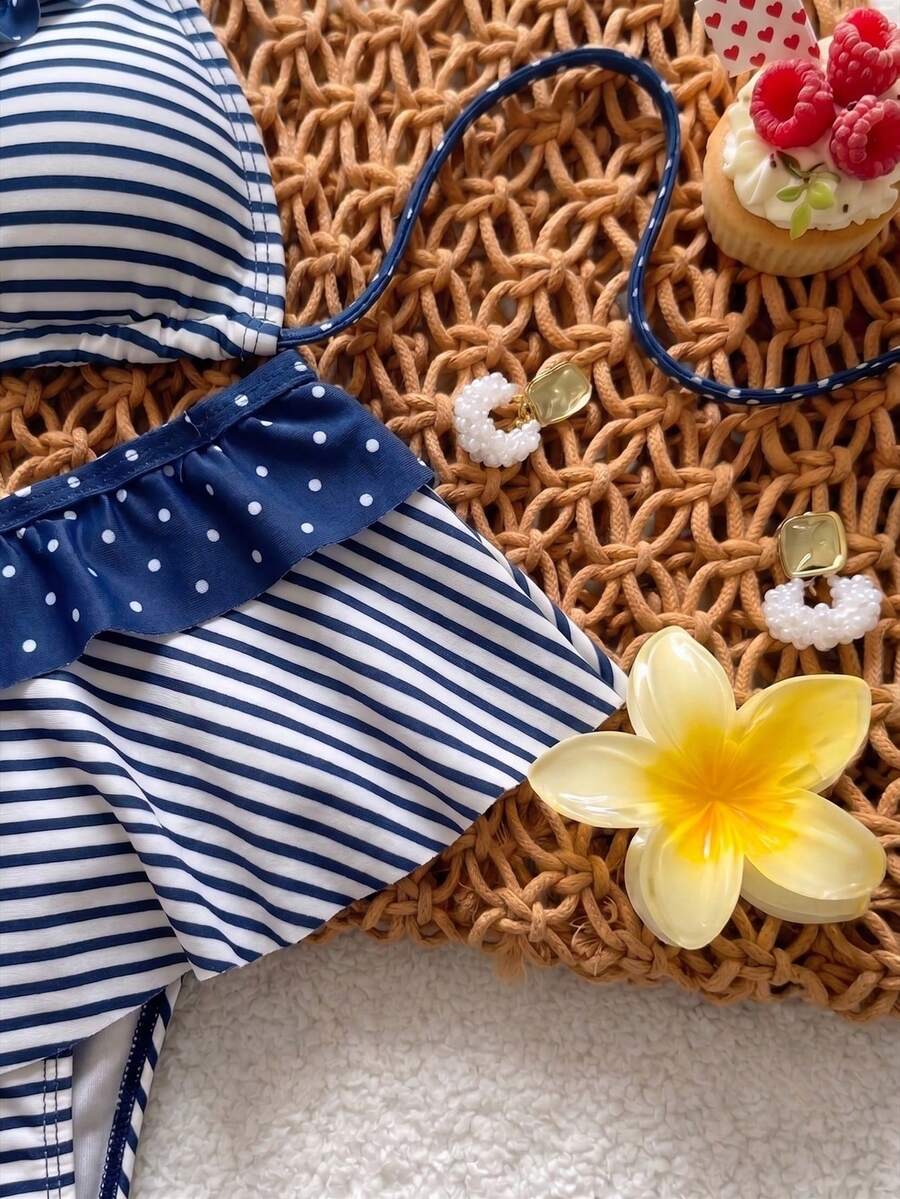 Women's ruffled halter two-piece bikini set with low waist bottoms and wireless triangle cups.
