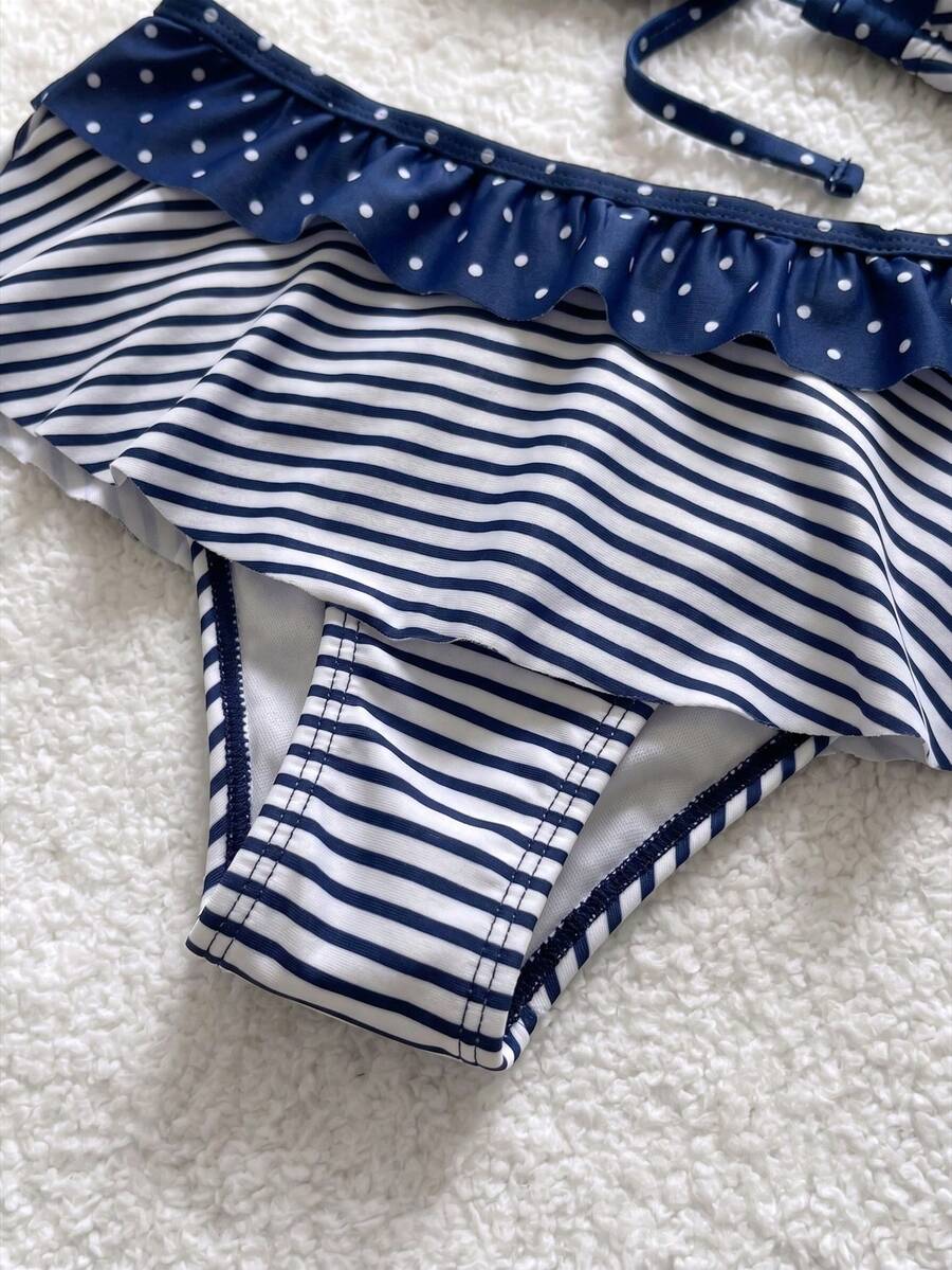 Women's ruffled halter two-piece bikini set with low waist bottoms and wireless triangle cups.