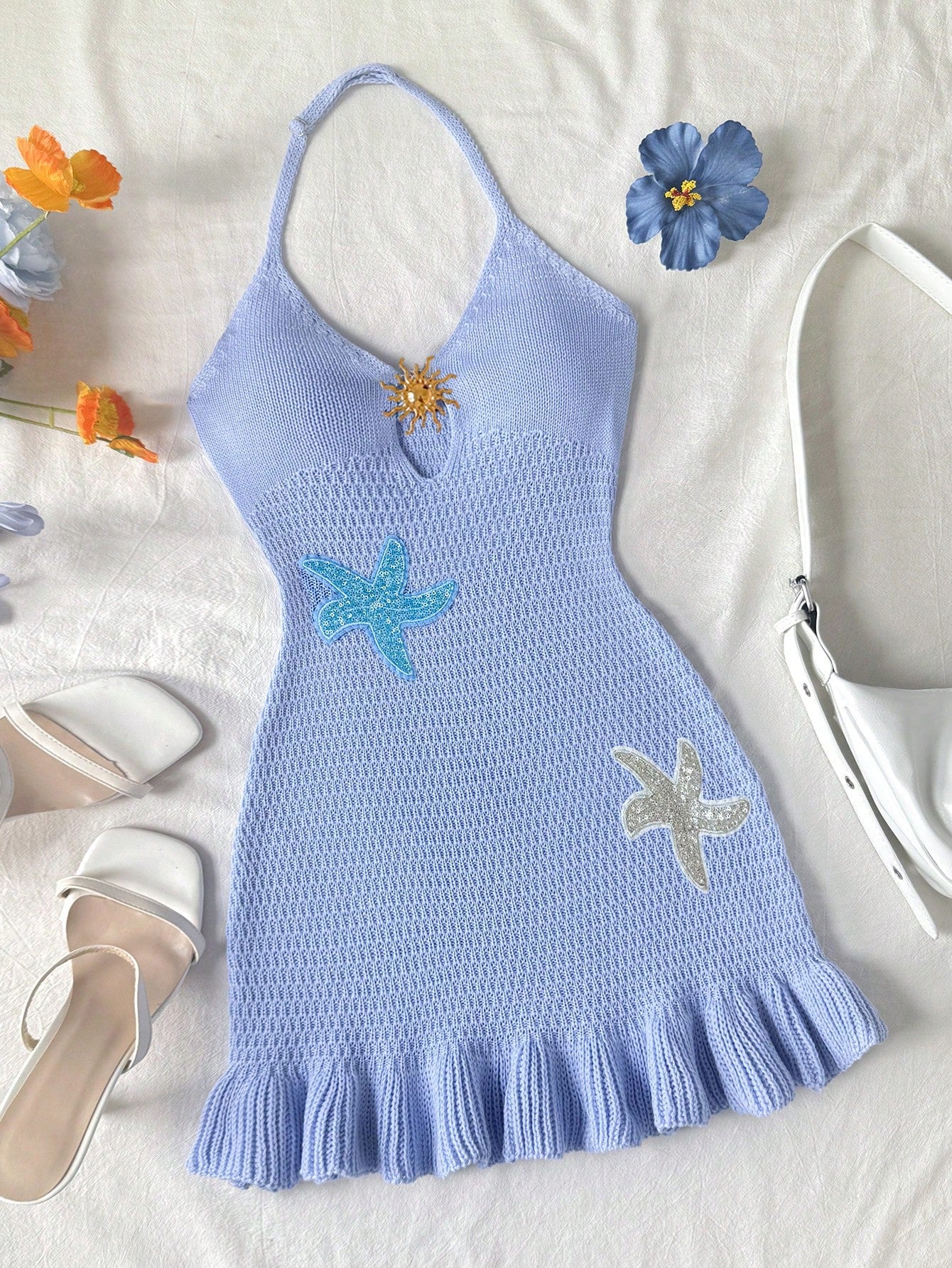 Tween girls long sleeveless halter cover-up dress with ruffle detail, plain fitted design, semi-sheer fabric, and metal starfish decoration.