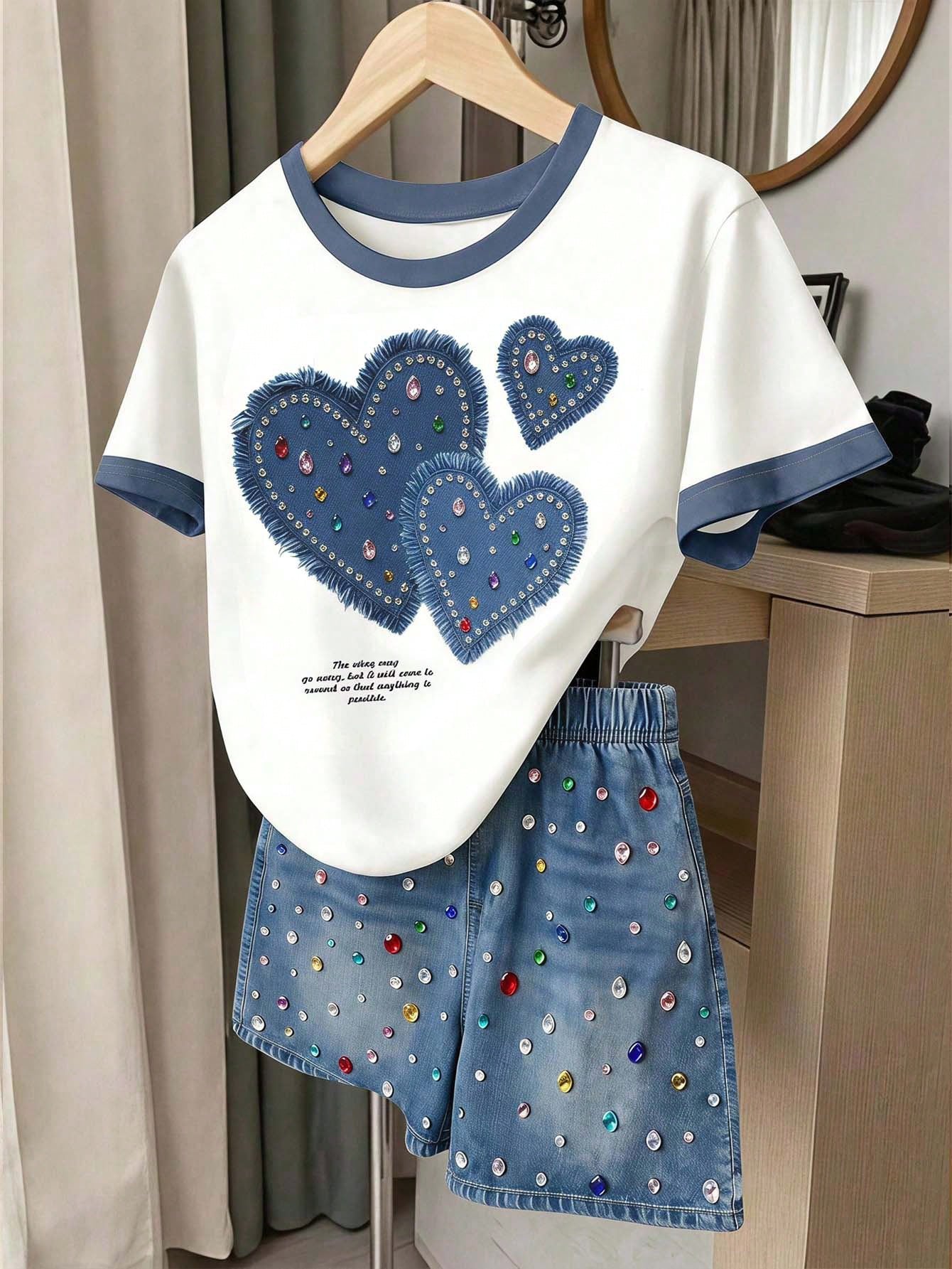 Girls' multicolor short sleeve T-shirt and shorts set featuring a cute cherry and bow print with round neck top and matching shorts.