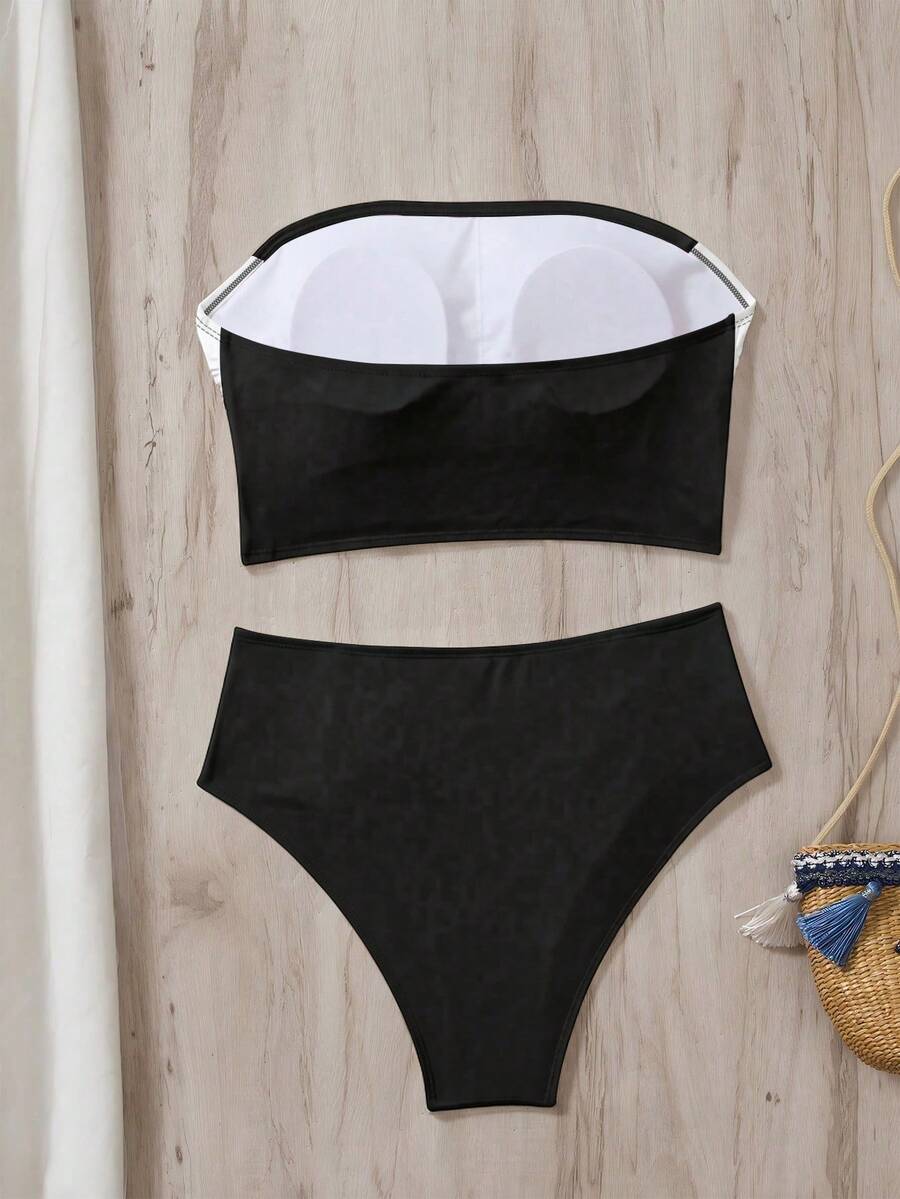 Women's black strapless ruched bandeau bikini top with high waisted bottoms