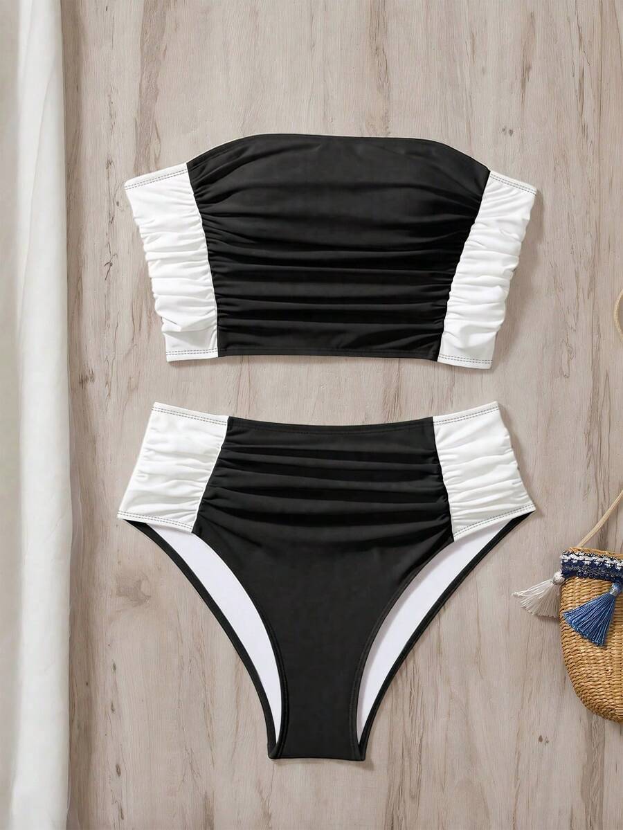 Women's black strapless ruched bandeau bikini top with high waisted bottoms