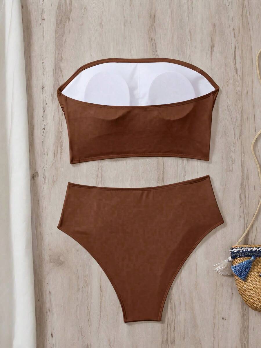 Women's black strapless ruched bandeau bikini top with high waisted bottoms